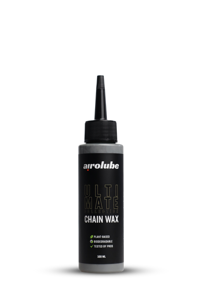100ml bottle of Ultimate Chain Wax, black label, plant-based and biodegradable bike lubricant